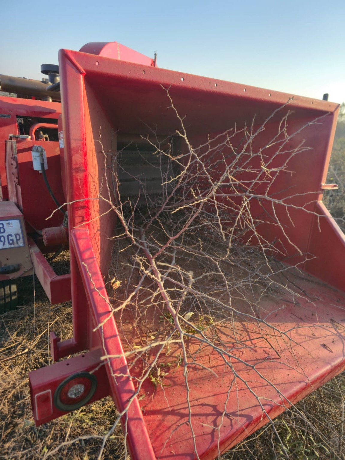 Commercial wood chipper clearing vegetation on a Gauteng construction site