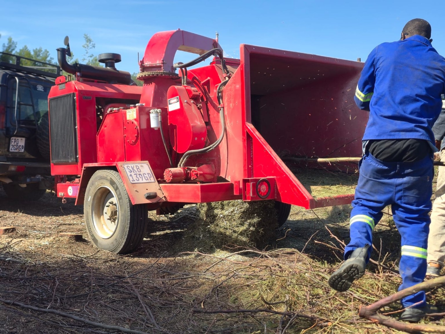 Blue gum and black wattle trees being cleared and chipped on a Gauteng farm