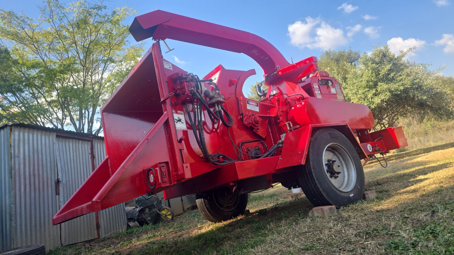 Wood chips spread as mulch along tree rows on a Gauteng farm